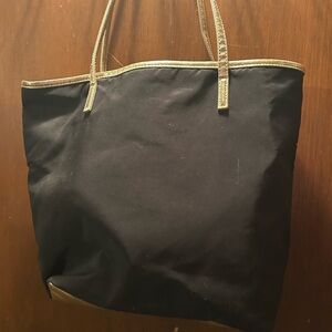 Elegant Black Tote with Gold Trim